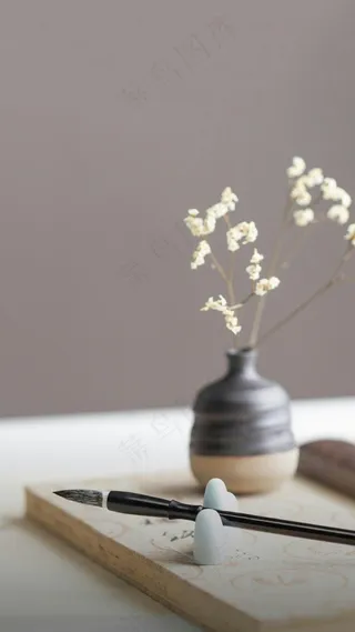 毛笔与花高清摄影图片