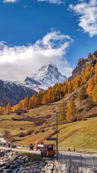 蓝天白云下的雪峰高清摄影图片