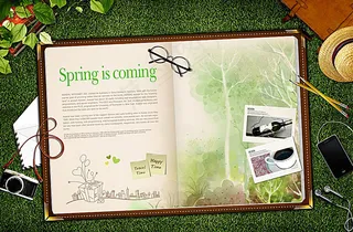 草地上的笔记本背景