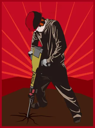 钻地面的建筑工人