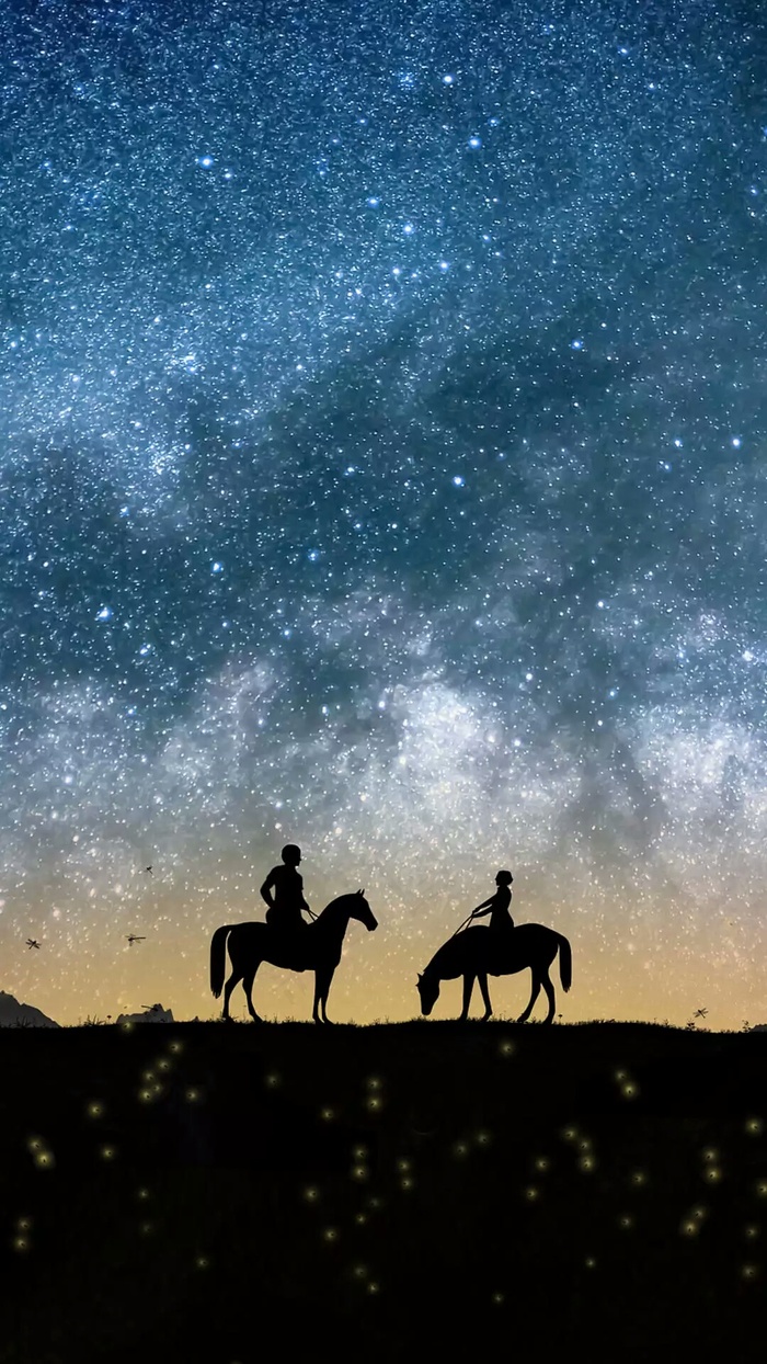 星云下骑马的人高清摄影图片
