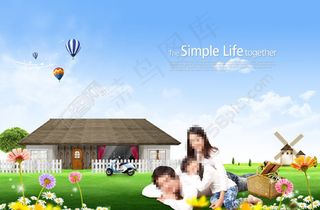 房屋前草地上的幸福家庭