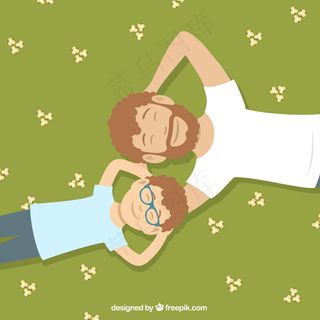 父亲和儿子躺在草地上