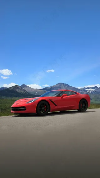 蓝天白云下的红色双人座跑车高清摄影图片