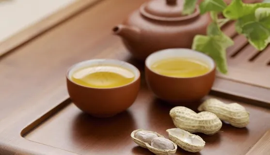 饮茶文化 茶具 茶杯配长生果图片