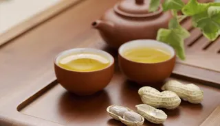 饮茶文化 茶具 茶杯配长生果图片