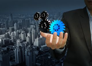 成功的商人显示齿轮