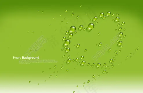 绿色背景上的组成心形的水滴