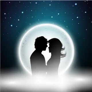 情人节的晚上背景轮廓的夫妇