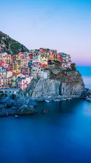 海岸上的房屋建筑高清摄影图片