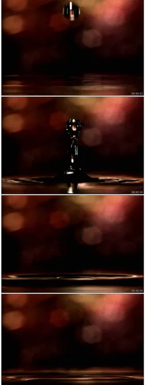 水珠滴入水中溅起大水花水珠特写