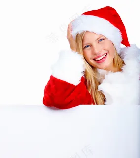 靠在空白广告牌上的圣诞美女图片