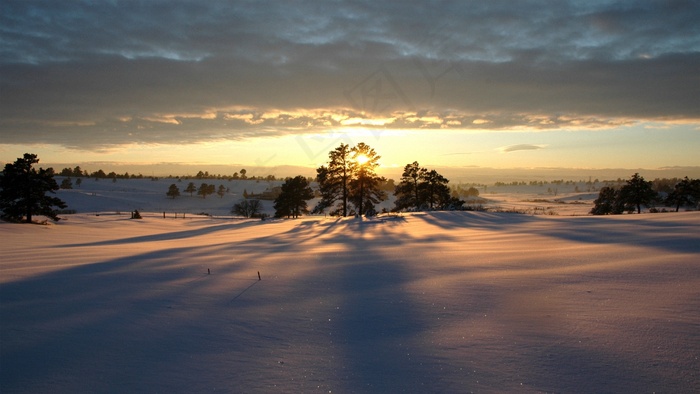 夕阳落日雪地风景背景素材图