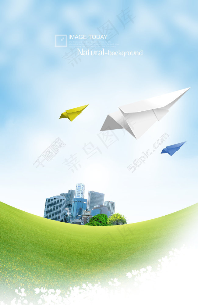 草地上的建筑和彩色纸飞机