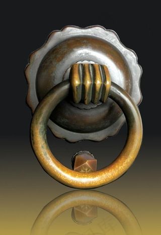 胡雪岩故居向征权力的紫铜门环图片