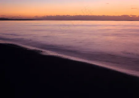 夕阳下海滩图片 夕阳下海滩图片
