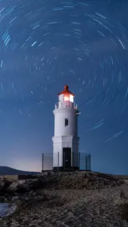 延时拍摄星空灯塔高清摄影图片 延时拍摄星空灯塔高清摄影图片