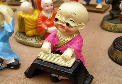 可爱的小泥人玩具 雕像图片