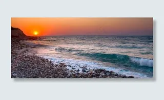 夕阳 海浪 海滩 鹅卵石图片