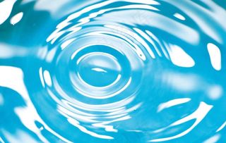 蓝色水面涟漪背景图片