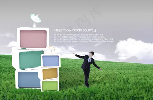 草地上的商务男士图片