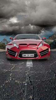 乌云下的炫酷跑车高清摄影图片