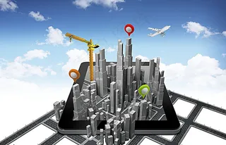 城市高楼大厦与平板电脑