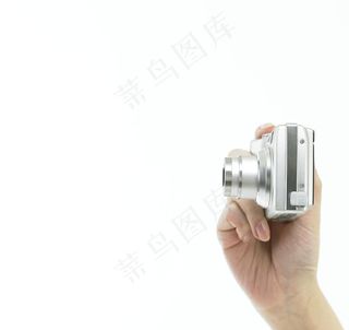 数码相机 手拿照相机图片