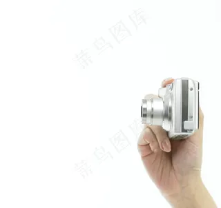 数码相机 手拿照相机图片