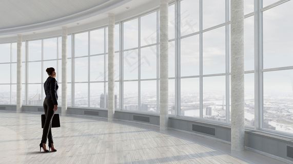 站在窗边的商务人士高清图片