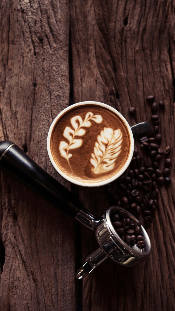 树叶图案的咖啡高清摄影图片