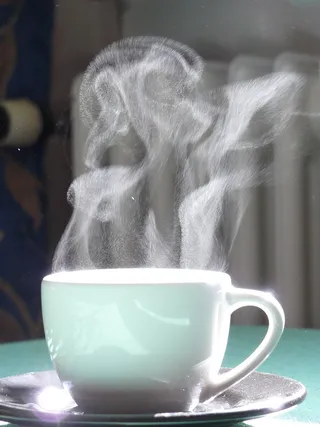 我冲了杯咖啡，它为我跳舞