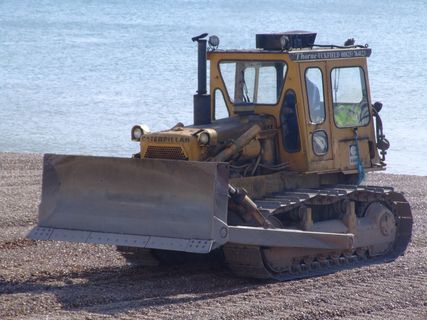 推土机,轮式装载机,压土机,挖掘机,羊足碾,推土机的肖像