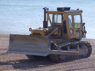 推土机,轮式装载机,压土机,挖掘机,羊足碾,推土机的肖像