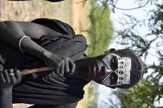 骷髅面具,雕像,卡通动漫人物,美女,人物特写,马赛族割礼仪式