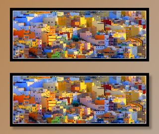 多彩的山坡邻里在里斯本，葡萄牙在早晨的阳光