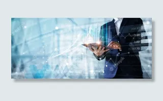 商人使用平板电脑分析销售数据和经济增长图表。