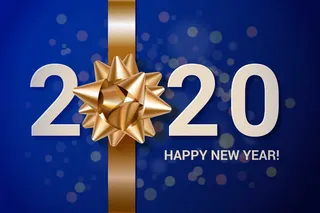 现实的新年背景与金色礼物蝴蝶结