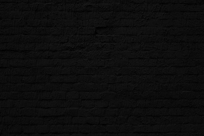 黑砖墙。阁楼室内设计。建筑背景。