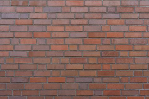 棕色砖墙作为背景或纹理。