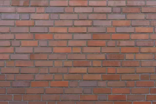 棕色砖墙作为背景或纹理。