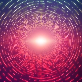 紫罗兰色背景上闪耀着闪光的无限圆形隧道