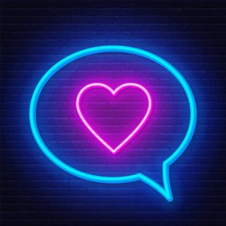 在黑暗背景下的演讲泡泡框中，霓虹灯符号。