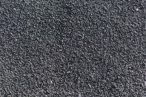 深灰色肮脏的墙面纹理背景和复制空间