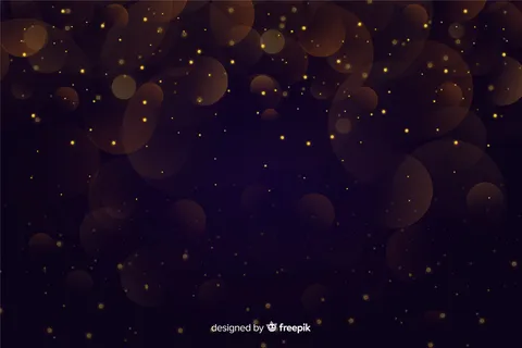 金色的粒子在黑暗的背景下跳跃 金色的粒子在黑暗的背景下跳跃