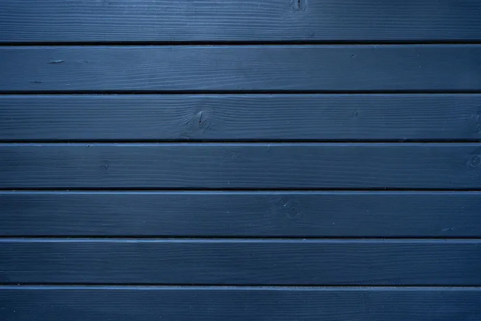 蓝色木纹理的木墙为背景和纹理。