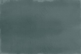 在帆布织地不很细背景的深绿油漆