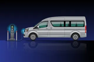 电动货车在充电站充电。电动汽车。在蓝黑背景下孤立。