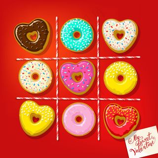 心形甜甜圈，桌上放着我甜蜜的情人节纸条。