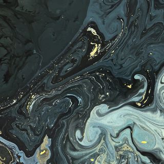 抽象液体质地，金色闪光背景